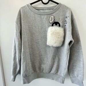 Genki Penguin sweatshirt with fluffy pocket